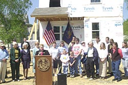 Alice Fox, Board President for Williamsport/Lycoming Habitat for Humanity is joined by Habitat volunteers 