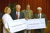 Commissioners Rebecca Burke, Dick Nassberg and Ernie Larson join Congressman Don Sherwood 